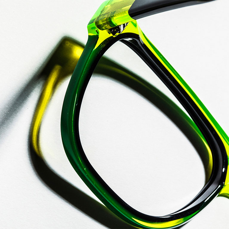 Creative closeup of glasses frame photographed by hard goods product photographer Kate Benson.