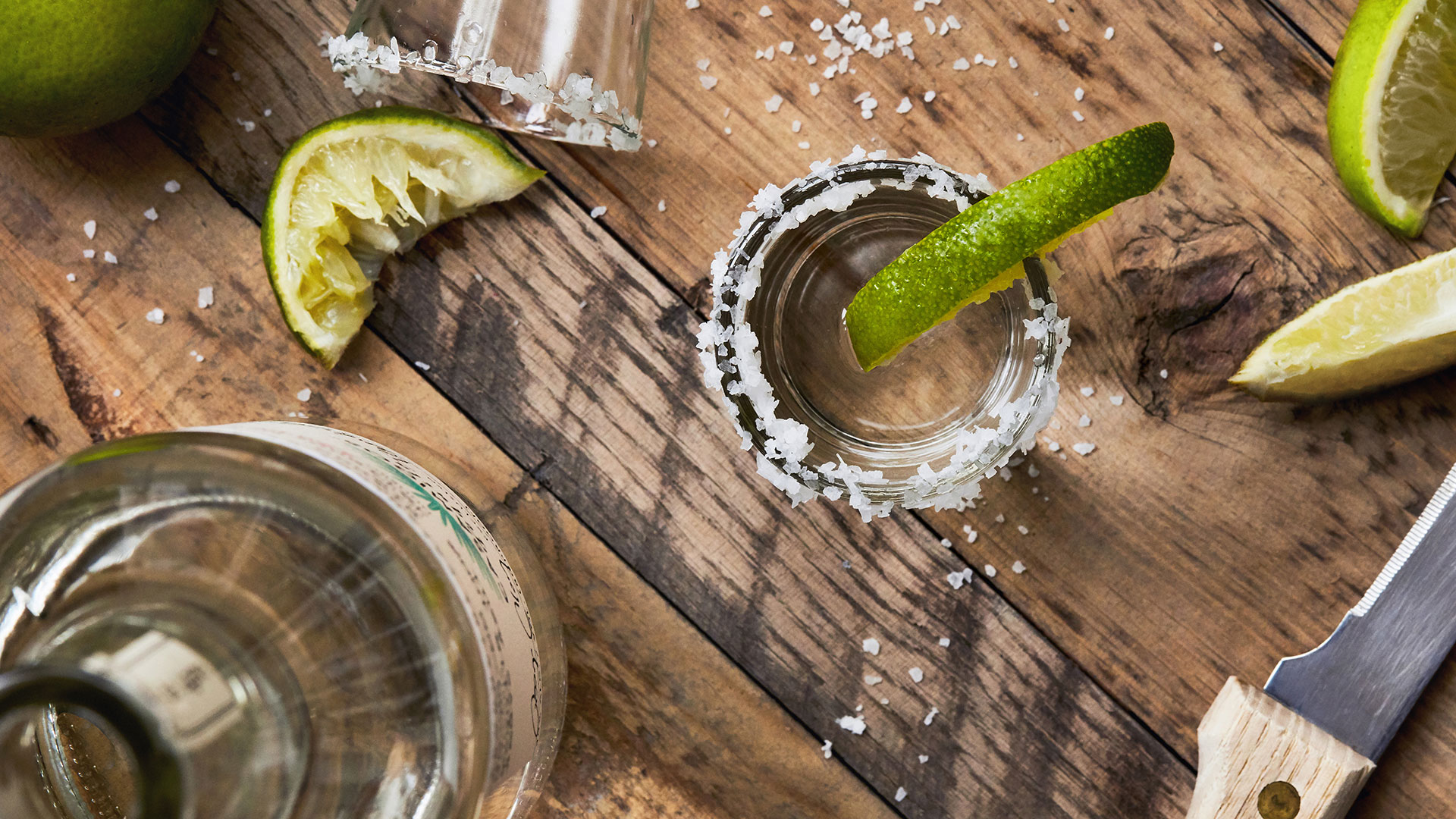 Lime drink with salt rim overhead by professional food & beverage photographer Kate Benson.
