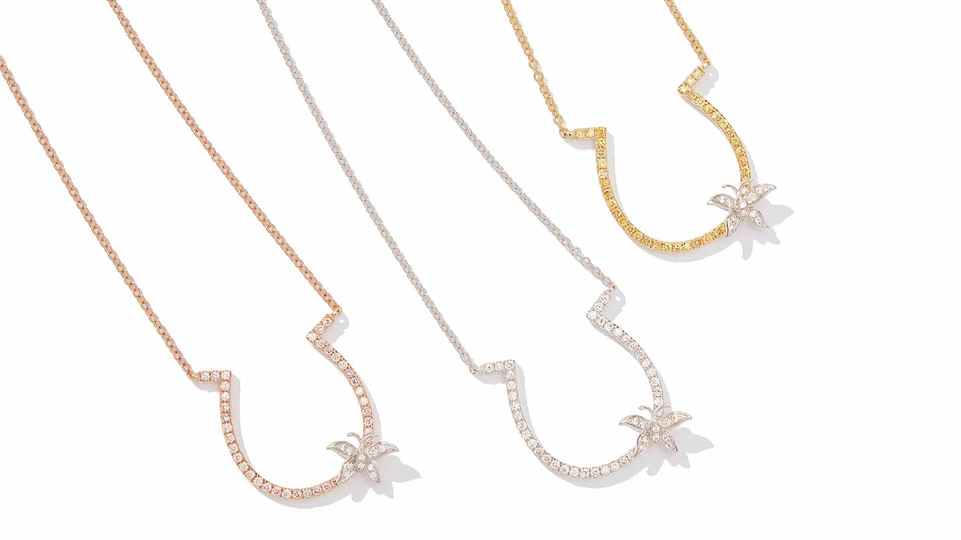 Gold diamond necklaces styled and photographed by fine jewelry photographer Kate Benson.