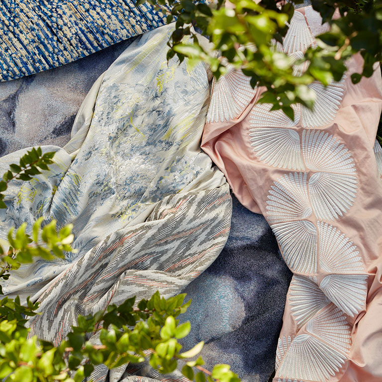 Pastel fabrics overlapping photographed by editorial product photographer Kate Benson.