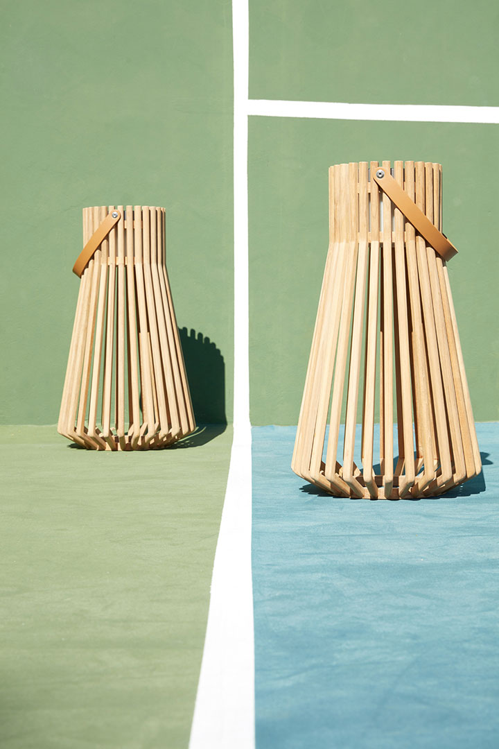 Wood end tables on tennis court photographed by professional product photographer Kate Benson.