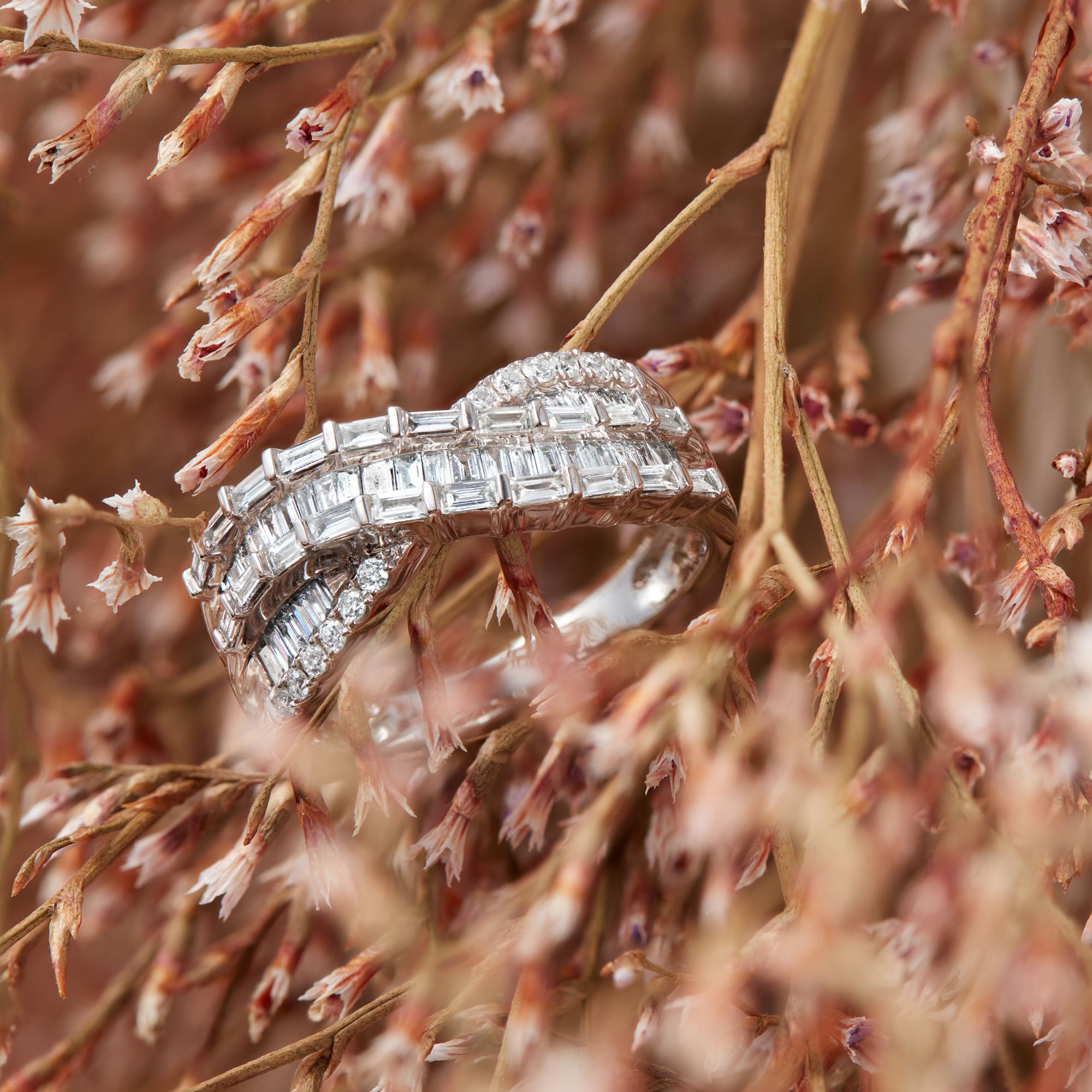 Jewelry Photographer Kate Benson photography portfolio diamond ring in flowers