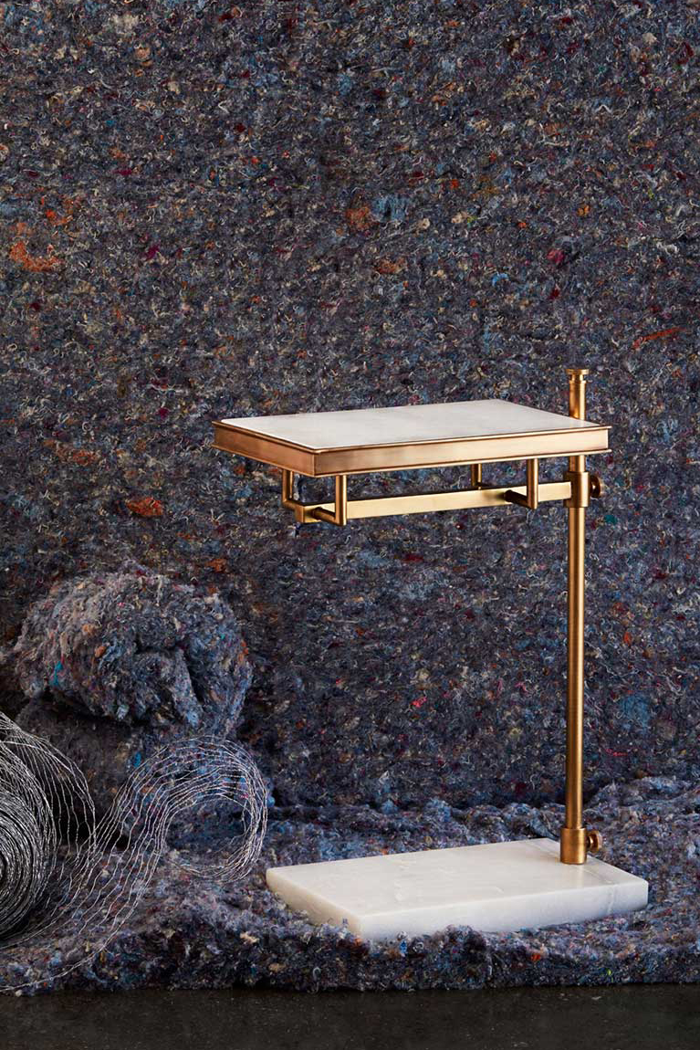 Side table with industrial backdrop photographed by professional still life furniture photographer Kate Benson.